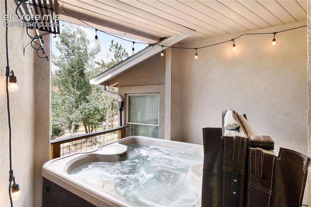 Image 31 of 50:  Covered 4-Person Hot Tub from the Hallway