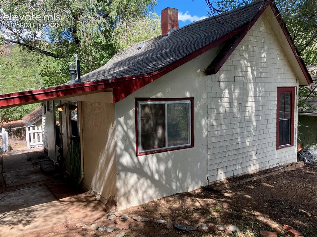 Image 10 of 18: Back of Main House