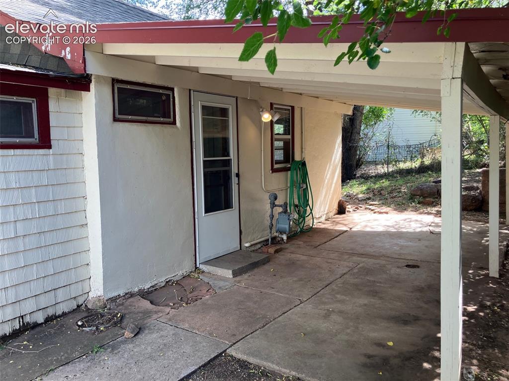Image 11 of 18: Covered Porch on Main House