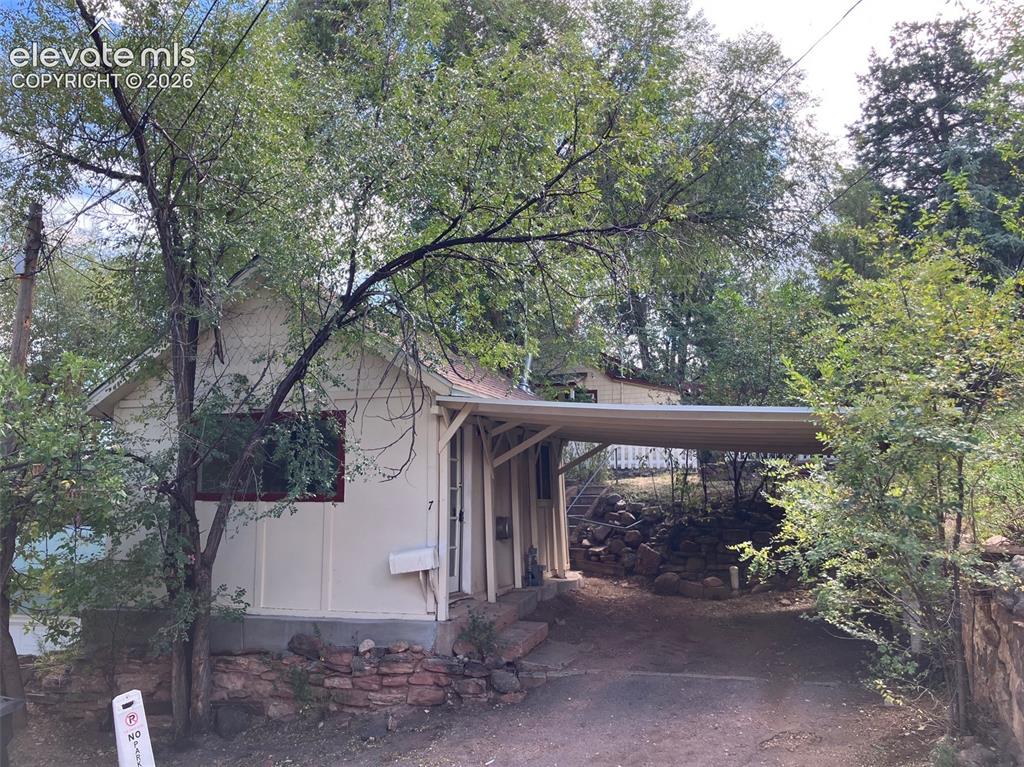 Image 12 of 18: Cottage with Carport
