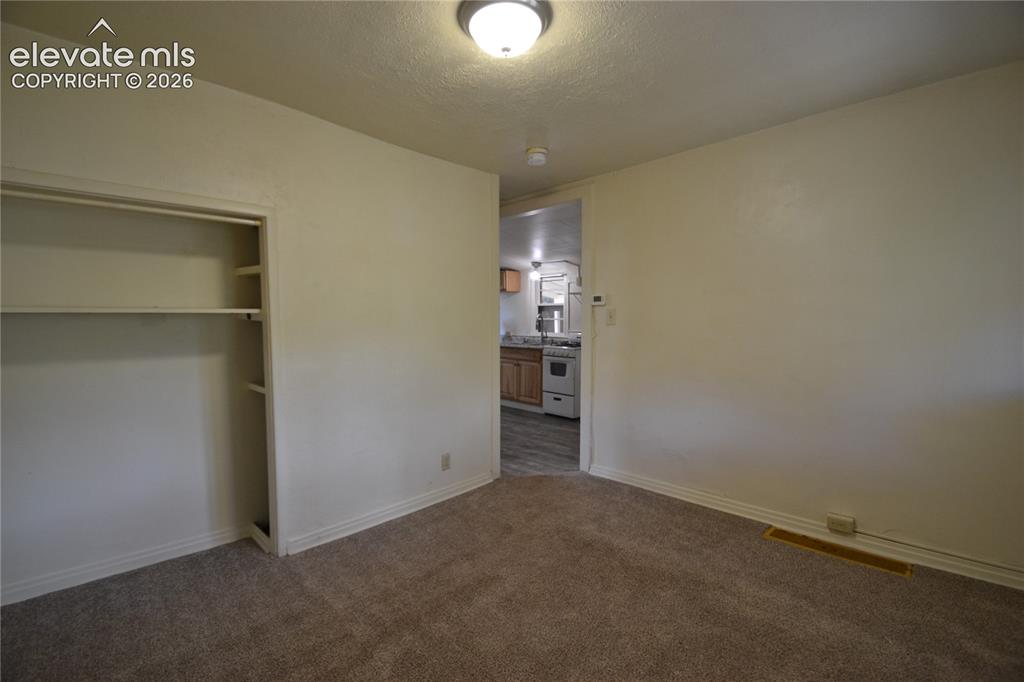 Image 7 of 18: Bedroom
