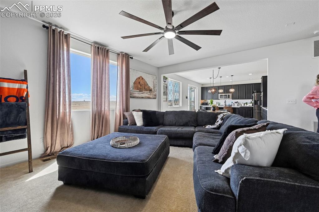 Image 5 of 43: Living area featuring recessed lighting and a ceiling fan with integrated i