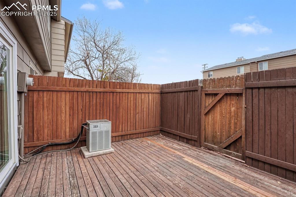 Image 7 of 32: Deck with a gate