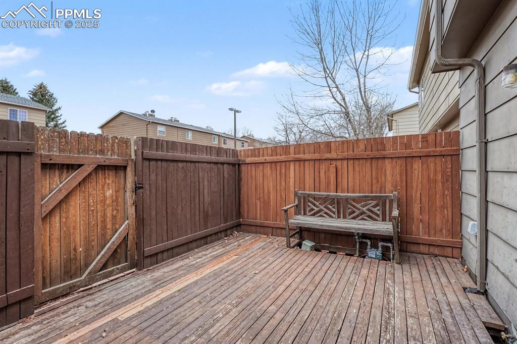 Image 8 of 32: Deck featuring a gate