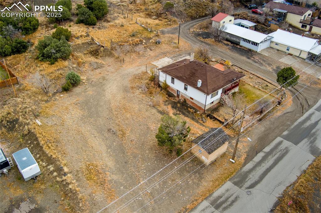 Image 26 of 30: Aerial view of property and surrounding area
