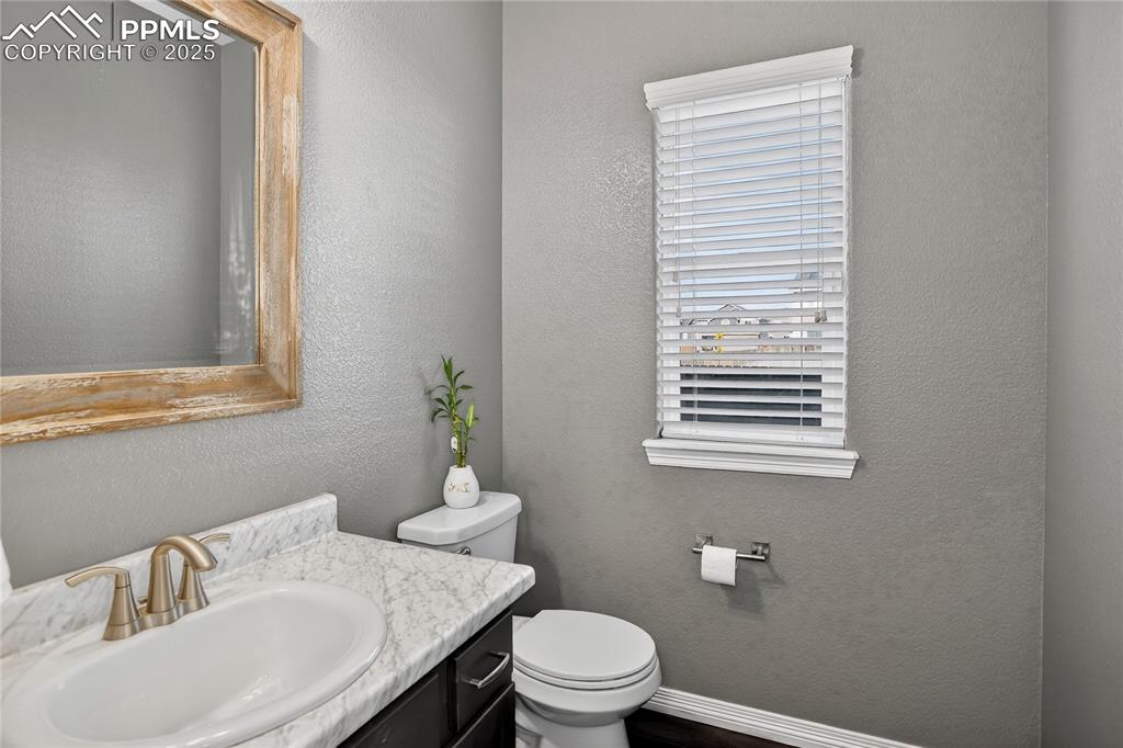 Image 9 of 26: Powder room - main level