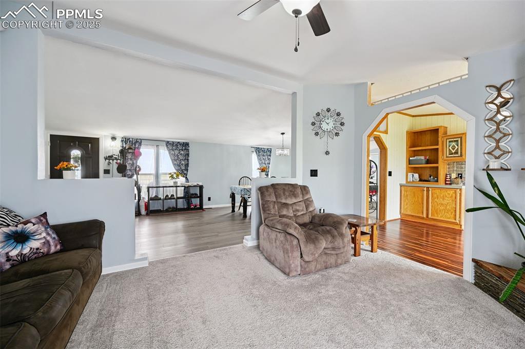 Image 11 of 48: Living Room Flows into dining room and kitche area
