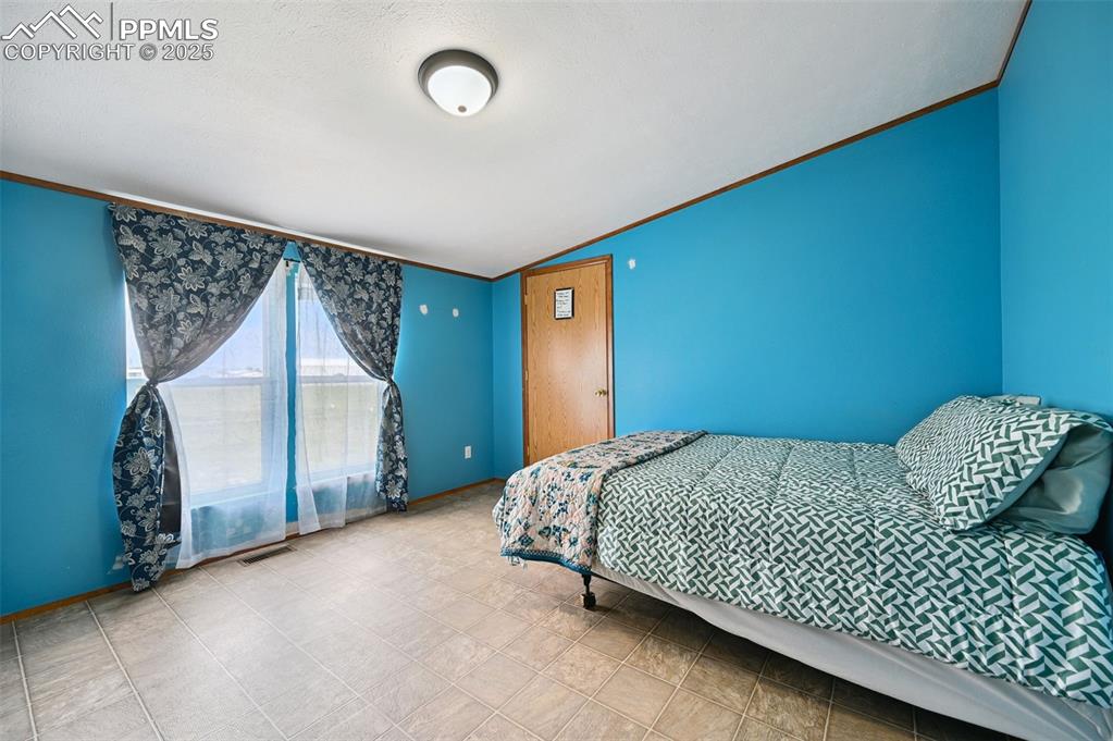 Image 30 of 48: Bedroom #3 LARGE WALK-IN CLOSET!