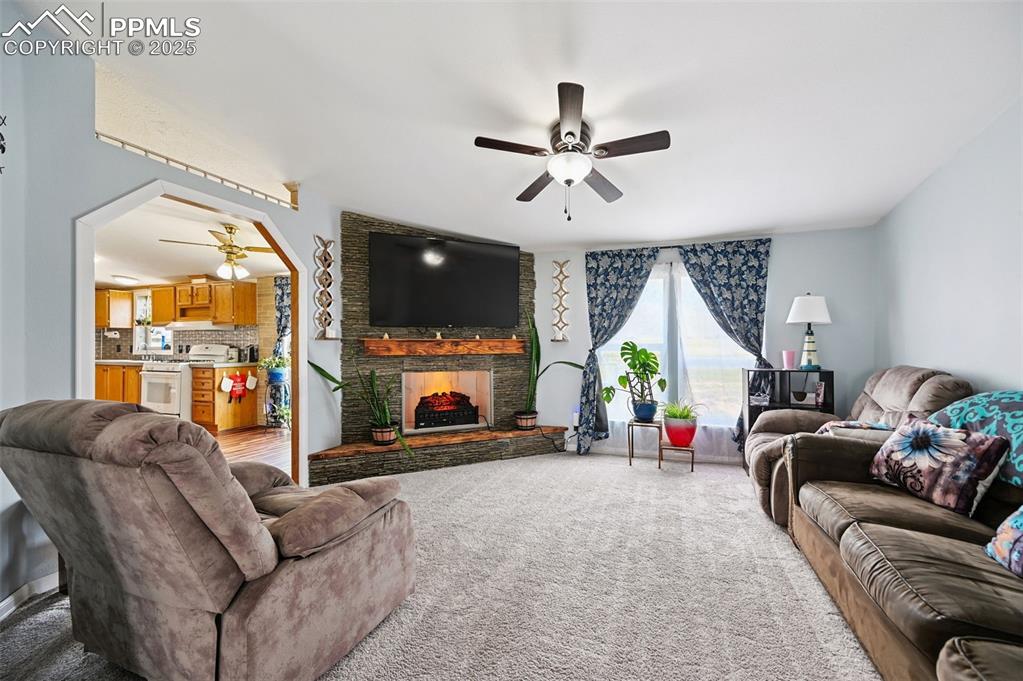 Image 9 of 48: Ceiling Fan, Electric Fireplace Corner, TV Included
