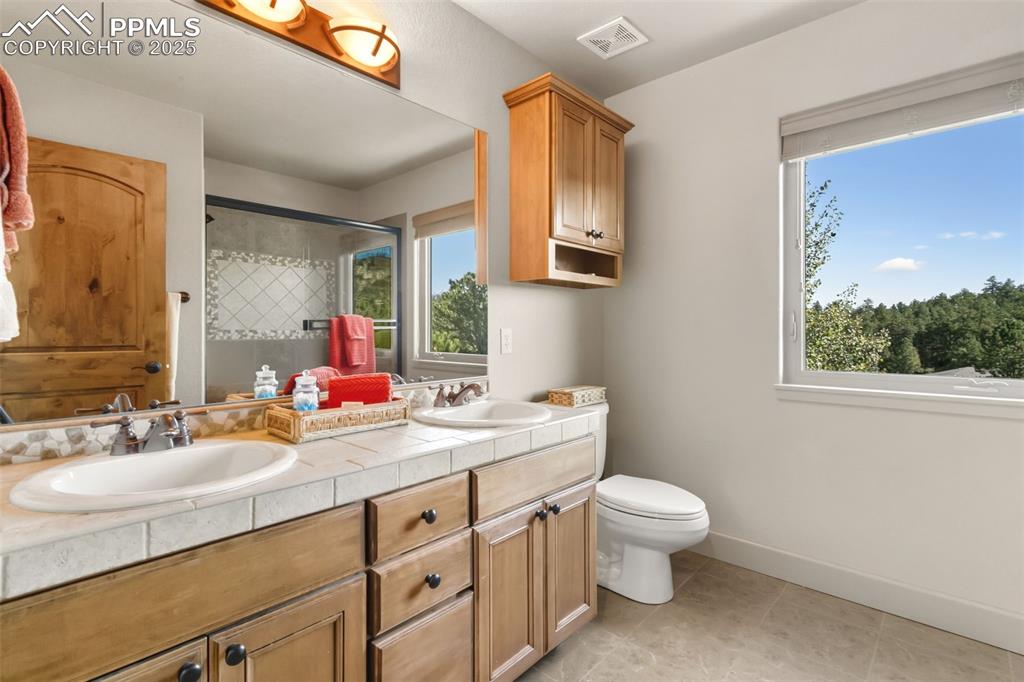 Image 32 of 50: Upper Level Full Bath