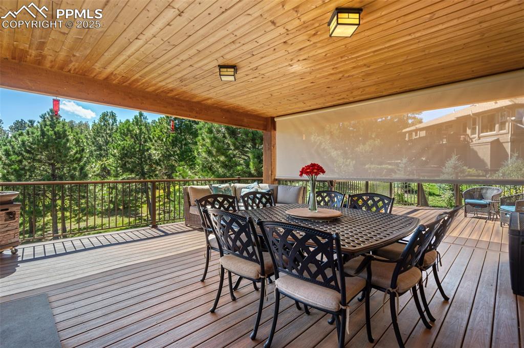 Image 41 of 50: Private Back Deck w/Retractable Screens