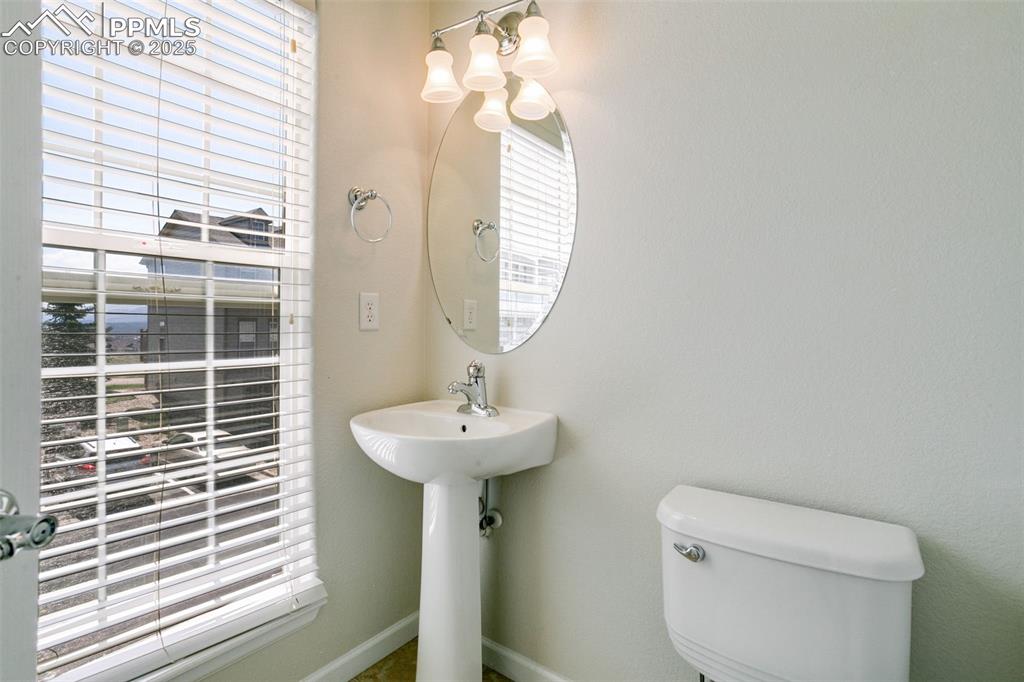 Image 13 of 28: Bathroom with toilet