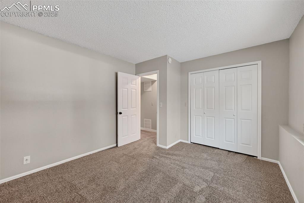 Image 32 of 38: Bedroom