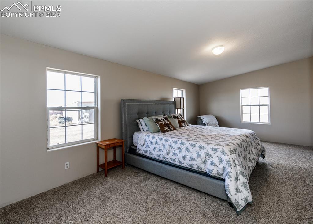 Image 24 of 50: Master Bedroom