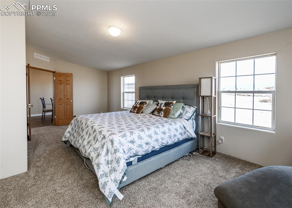 Image 25 of 50: Master Bedroom