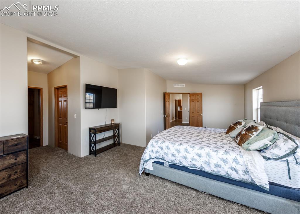 Image 26 of 50: Master Bedroom