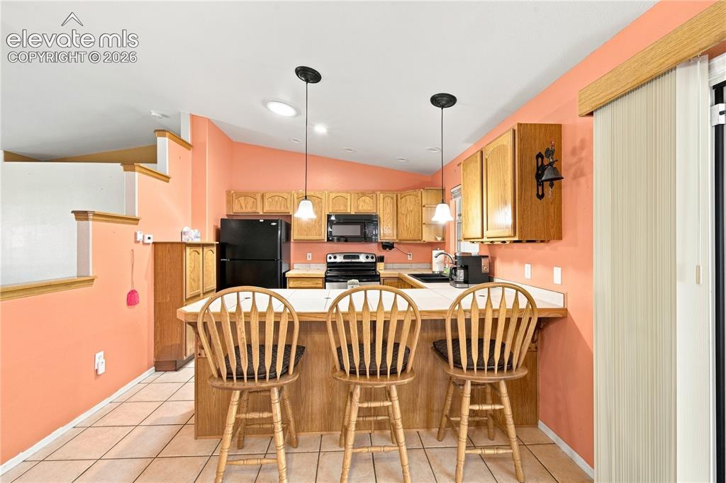 Image 11 of 38: Kitchen
