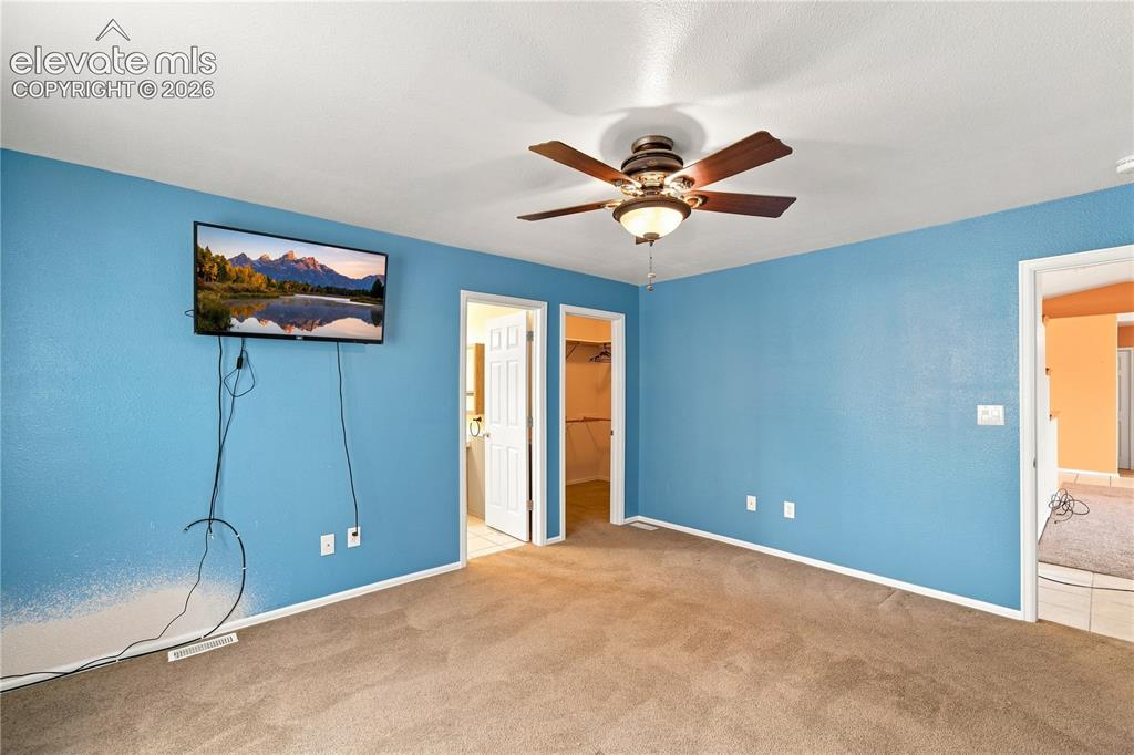 Image 14 of 38: Master Bedroom