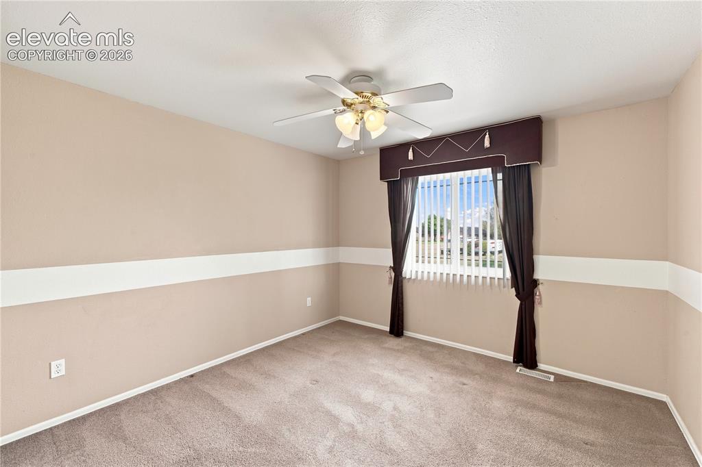 Image 19 of 38: Bedroom