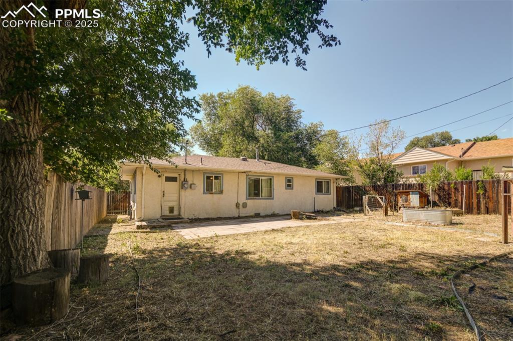 Image 23 of 23: Plenty of room for gardening & backyard BBQ