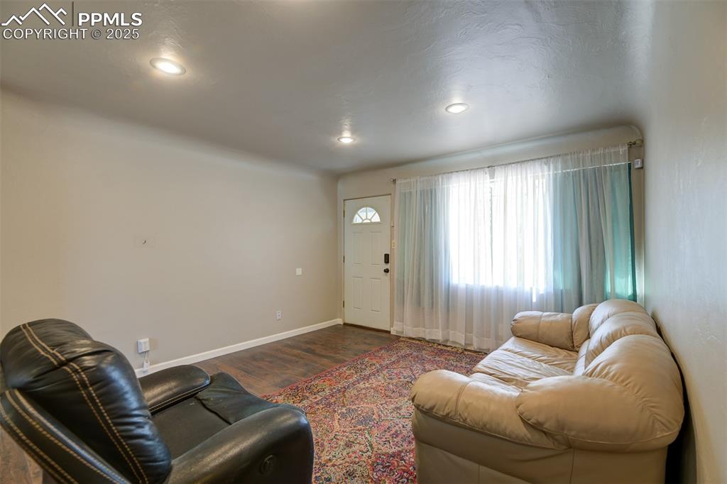 Image 5 of 23: Living room with engineered wood flooring