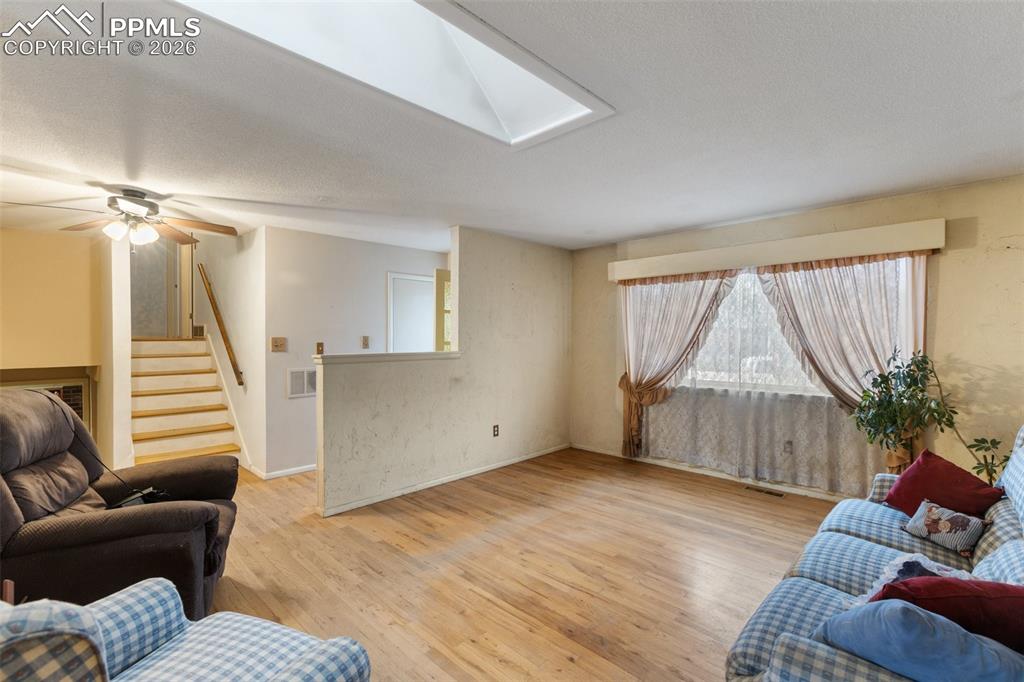 Image 10 of 34: Main level living room