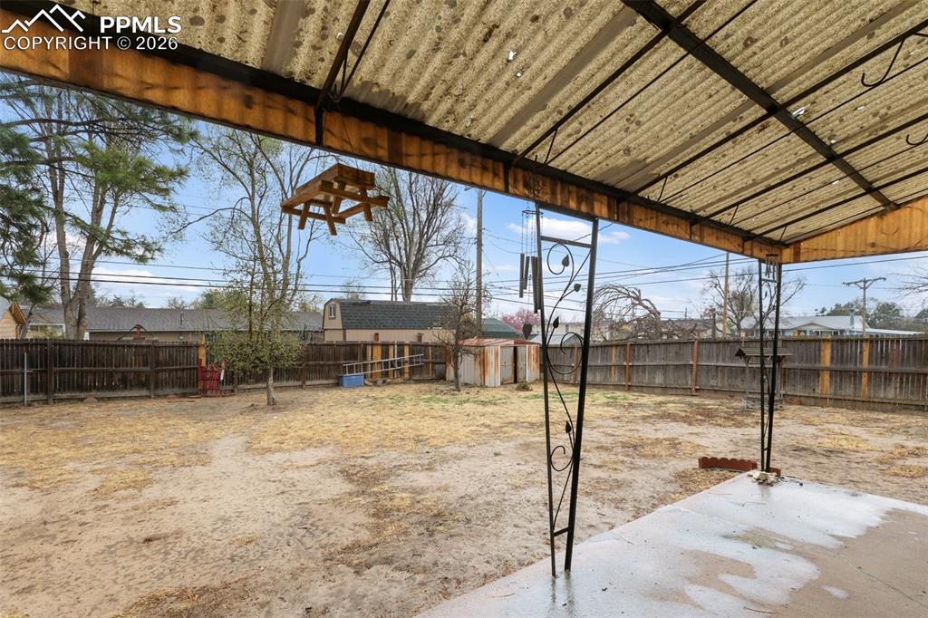 Image 2 of 34: Covered patio