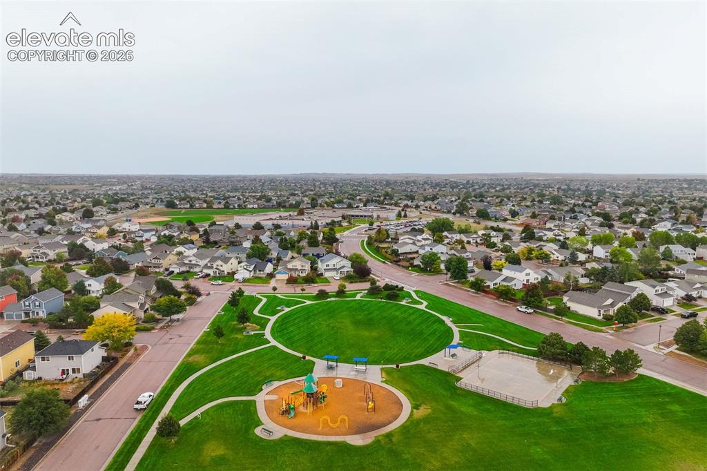 Image 42 of 43: Expansive neighborhood featuring numerous residential properties and a cent