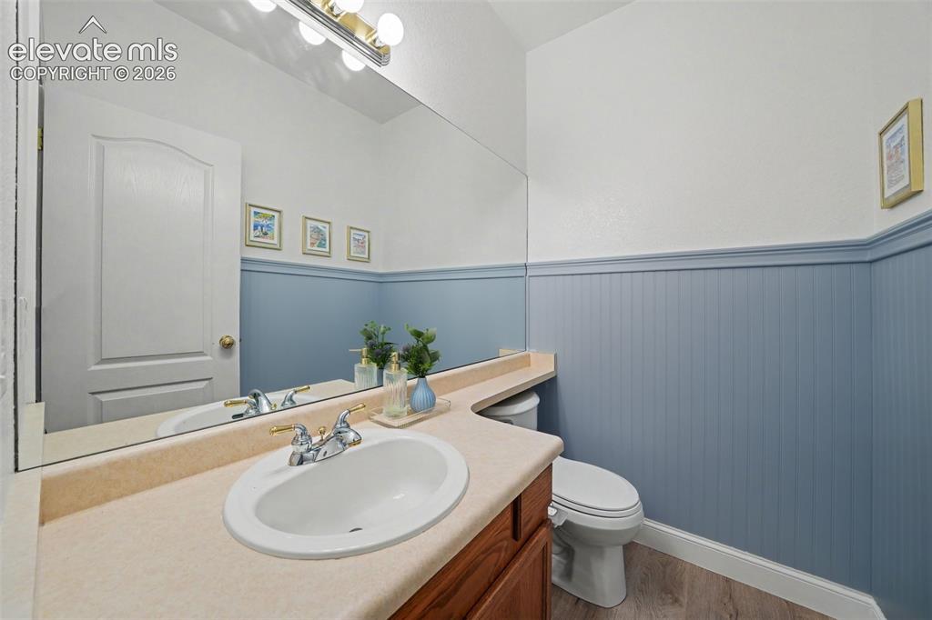 Image 10 of 26: Main Level Powder Room