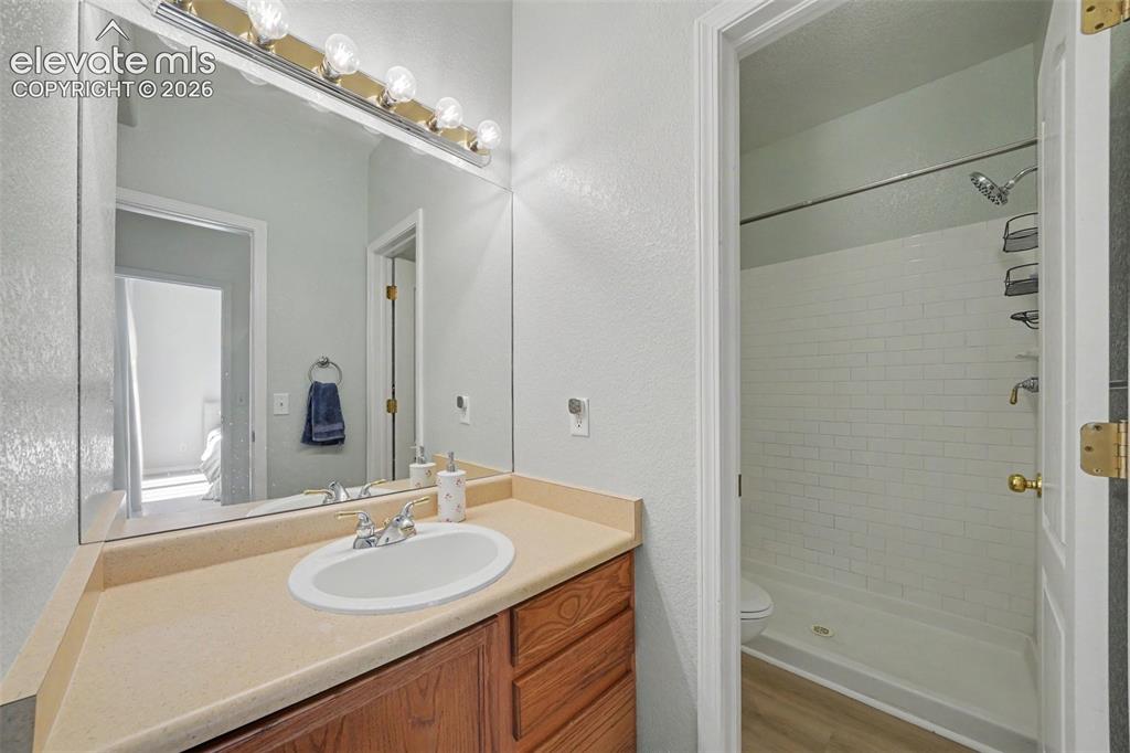 Image 13 of 26: Attached Bathroom