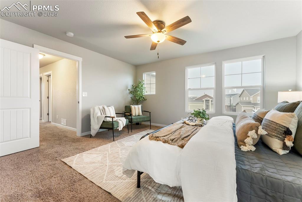 Image 18 of 50: Bedroom featuring carpet flooring and ceiling fan