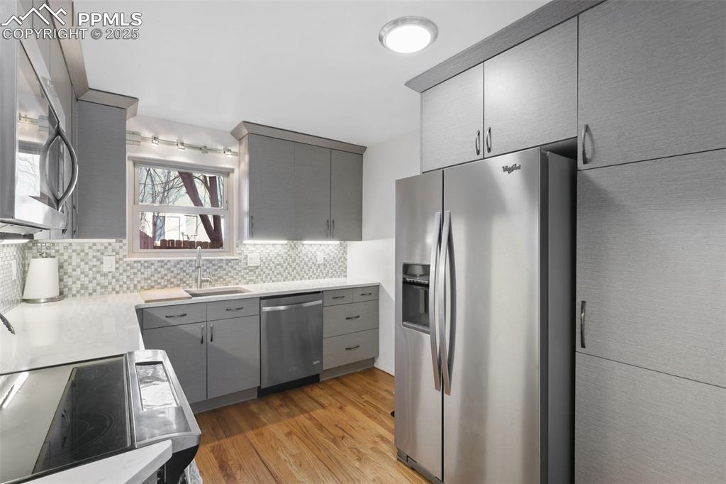 Image 11 of 31: The kitchen has been fully renovated to feature all new cabinetry, granite 