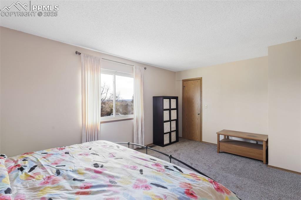 Image 16 of 31: View 3 of upper level primary bedroom.