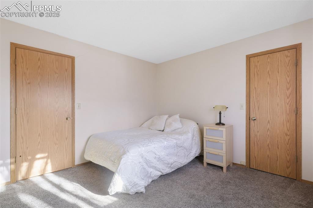 Image 19 of 31: View 2 of bedroom 2 on the upper level.