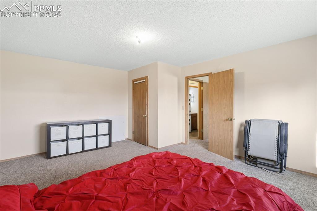 Image 24 of 31: View 2 of bedroom 3 on lower level.