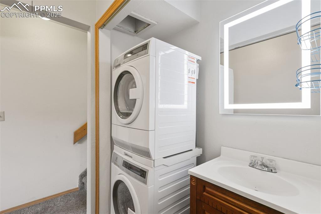 Image 27 of 31: The laundry is located on the lower level as you enter the 3/4 bath. Be sur