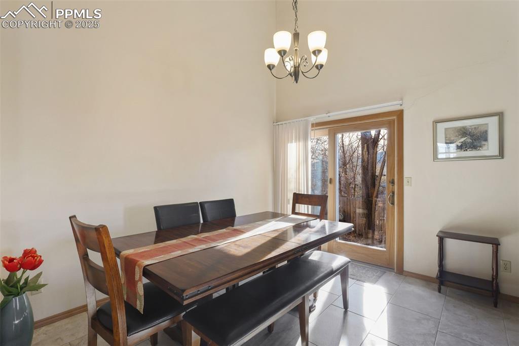 Image 9 of 31: The spacious, tiled dining area is perfect for family meals and also for en