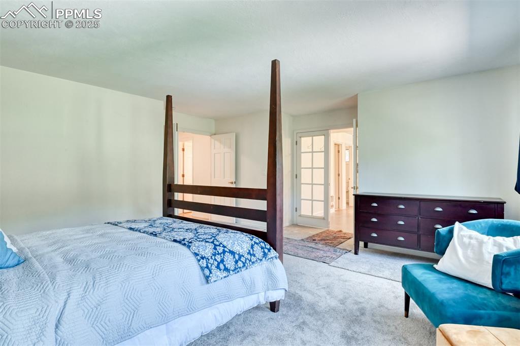 Image 21 of 50: View of carpeted bedroom