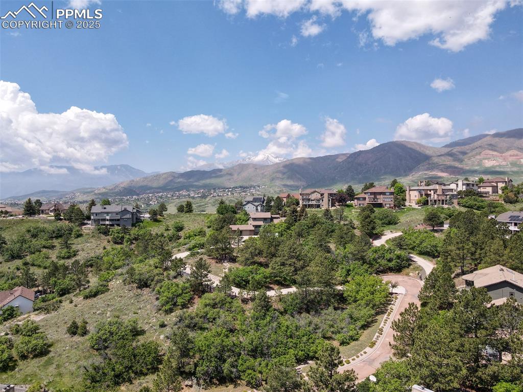 Image 49 of 50: View of mountain background featuring nearby suburban area