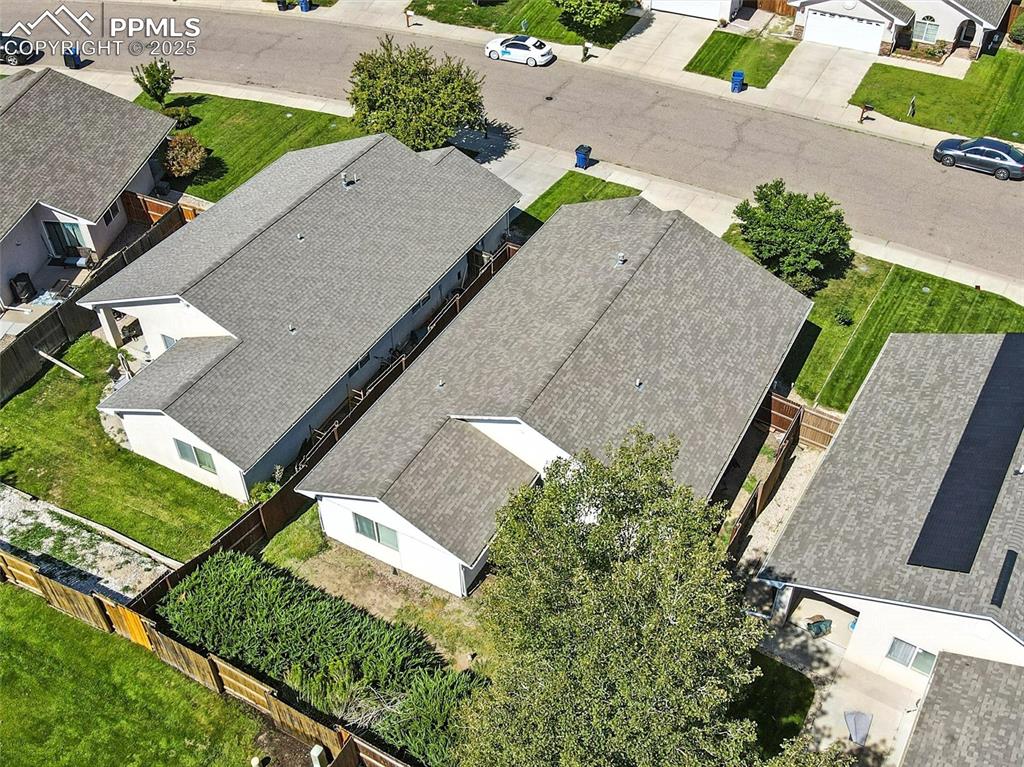 Image 9 of 38: Angle shot - Aerial view rear of house