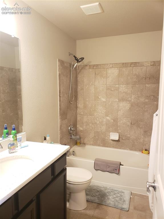 Image 26 of 34: Full bathroom featuring a single vanity with a white countertop, an undermo