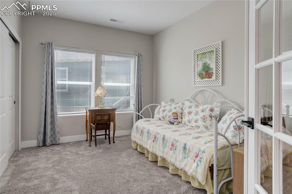 Image 15 of 22: Office with French doors