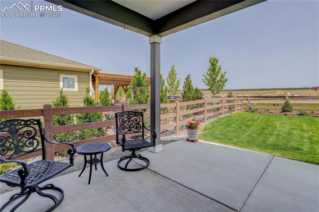 Image 18 of 22: Covered patio