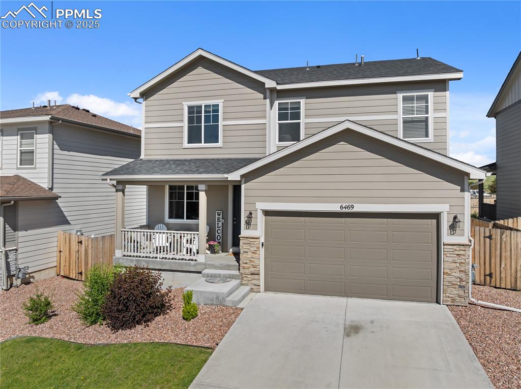 Caption: Front View Landscaped Yard