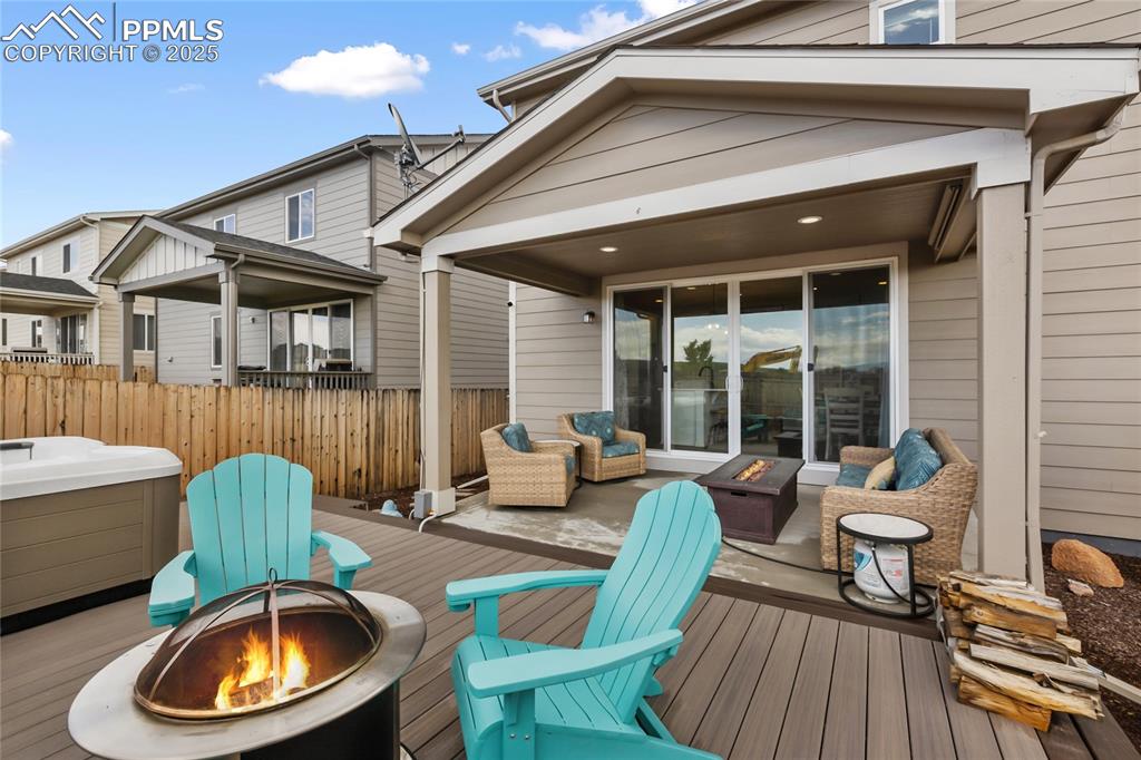 Image 29 of 48: Outdoor Area Trex Deck and Hot Tub