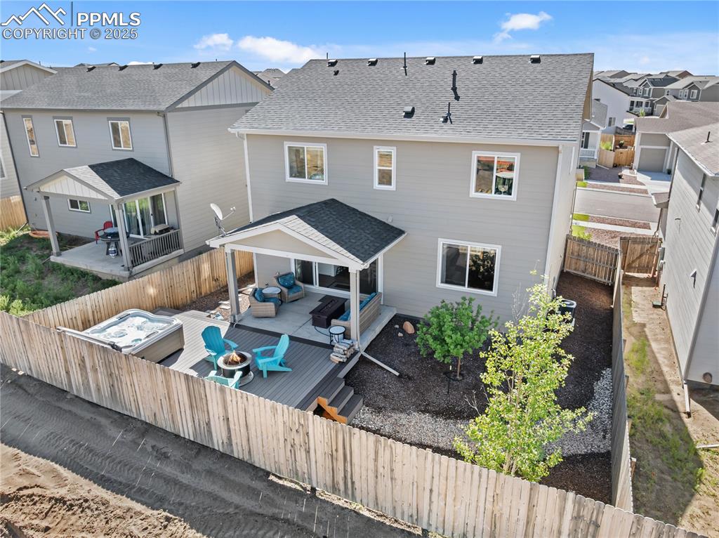 Image 40 of 48: Back View Outdoor Area Fenced and Private