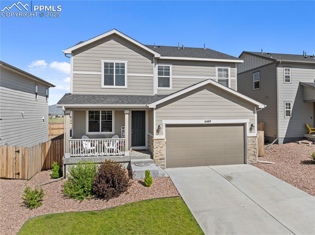 Image 42 of 48: Front View Landscaped Yard