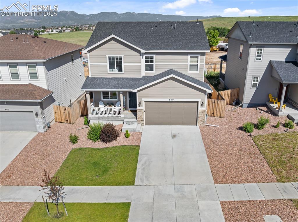 Image 43 of 48: Front View Landscaped Yard