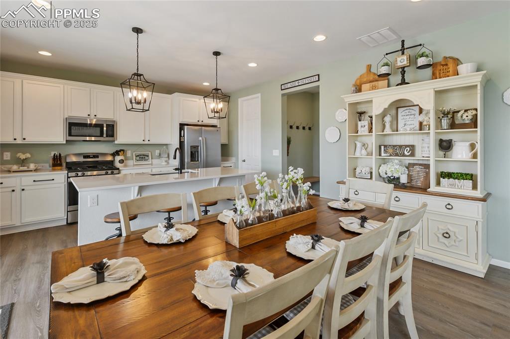 Image 8 of 48: Kitchen Open To Dinning Area