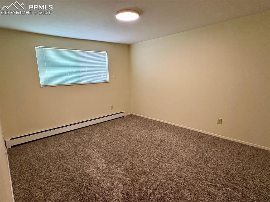 Image 12 of 27: Unit 4 bedroom
